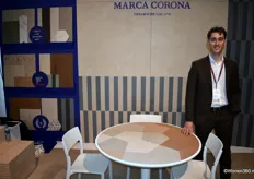 Nicola Borsari from the Italian ceramics company Marca Corona, founded in 1741, posing with a new project collection of floor tiles, available in the size 1.20 x 1.20 and in four colors.