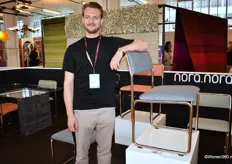 Aaron van Bindsbergen from nora.nora poses with the new chair collection, which he himself calls archetypal design for pragmatic sustainability. The noranora collection is inspired in design and comfort by the function of the product and makes a statement with it.