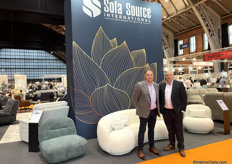 Mark Gannon, CEO of the Irish company Sofa Source and his brother David. The curved sofa behind them is especially popular in European countries.