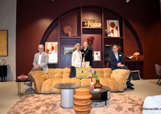 The colorful booth of the Dutch furniture brand Xooon, styled by decoration brand COCOmaison. From left to right: Commercial Director Frans Herman, Nicole van Riel (concept manager at Xooon), Charlotte van den Bosch (concept manager at COCOmaison), and Export Manager Jan Wehrman.