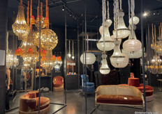 Chandeliers, chairs and ottomans by Labyrinthe Interiors.