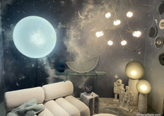 The Full Moon room: featuring lightness and transparency with a backdrop of cloudy whites and grayish blues.