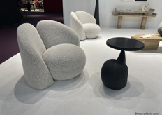 Boucle armchairs and sofa's are one of the brand staples. But also fun pieces which we could see in their catalogue, like an armchair with bunny ears and a croissant sofa.