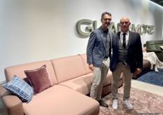 Giuseppe Priano and Idamo of Glam-more in front of the Italian brand's latest sofa.