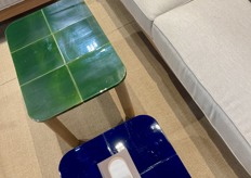 Coffee tables covered with tiles were a frequent sight at the fair. These ones are from Calma.