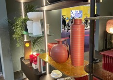 Colored glass wall shelves, as seen here at Papadatos.